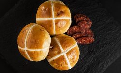 Chorizo hot cross buns made using Crossing Mix
