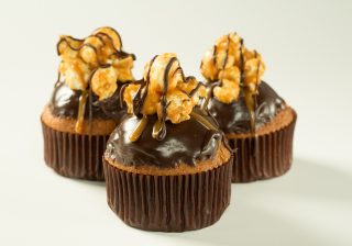 Popcorn Muffins with 5th Avenue® Chocolate Icing