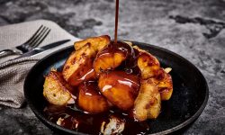 Macphie Plant-based Demi-Glace on top of roast potatoes