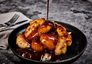 Macphie Plant-based Demi-Glace on top of roast potatoes